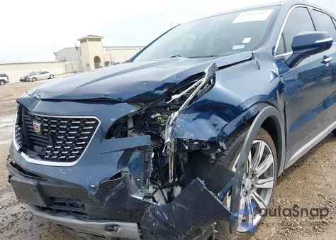 2021 Cadillac Xt4 Fwd Premium Luxury from USA, damaged, VIN 1GYFZCR47MF083284